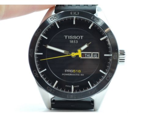 A gent's Tissot PR516 Powermatic 80 wrist watch, no: T100430A having baton numeral dial and day/date aperture to black face w