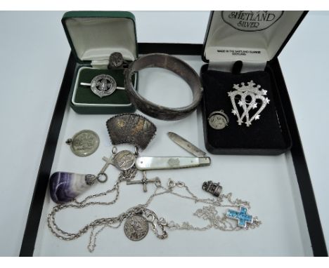 A selection of HM silver and white metal jewellery including hinged bangle, Luckenbooth brooch, Blue John pendant, folding fr
