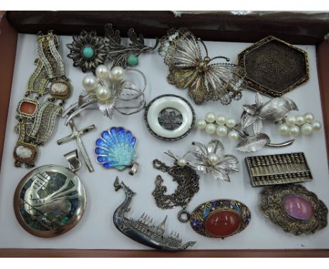 A small selection of white metal jewellery, most stamped silver including filigree, Indian abacus brooch, enamelled pendant, 