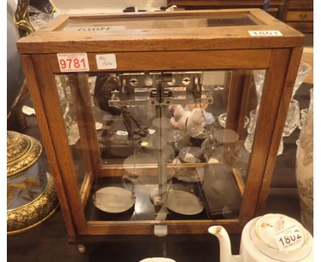 Pair of scientific scales by John Harcourt and associated boxed weights
