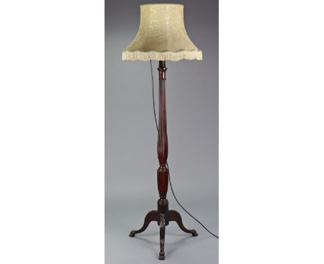 A mahogany Chippendale-style standard lamp with turned &amp; fluted column on three carved cabriole legs, 61¾” high; &amp; a 