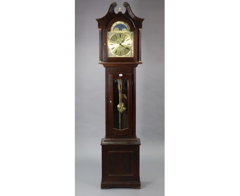 A reproduction longcase clock with a brass dial, &amp; in an oak-finish case, 79” high.