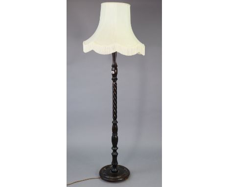 A beech standard lamp with a turned &amp; barley-twist centre column, with shade; &amp; various decorative pictures.