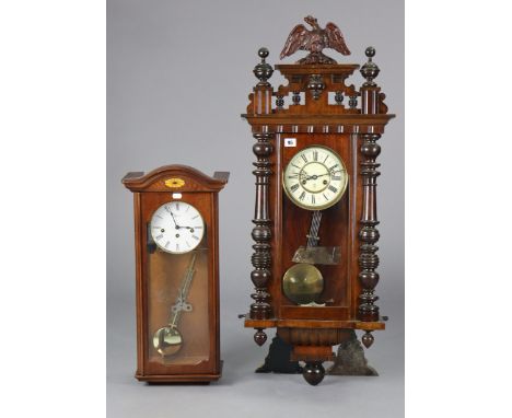 A Vienna-type wall clock with black roman numerals to the cream enamel dial, &amp; in a glazed walnut case, 42” high; &amp; a