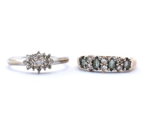 A pair of hallmarked 9ct gold rings to include a half eternity ring set with CZ's and faceted green stones, hallmarked for Bi