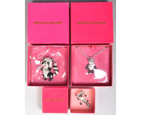 A group of three Butler and Wilson crystal set jewellery to include a large pendant in the form of a raccoon with black ename