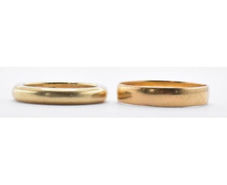 Two gold band rings to include one hallmarked 22ct gold band ring (hallmarked Birmingham 1912,weight 2.1g, size O.5) and a 14