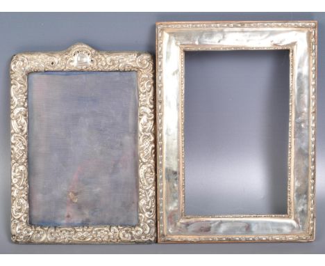 Two&nbsp; silver fronted photo frames to include a late Victorian repousse fronted photo frame with scrolled decoration (hall