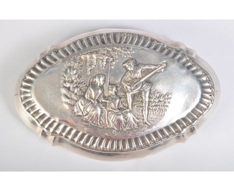 A Late Victorian hallmarked silver trinket box featuring a repousse scene to the lid featuring a man playing a lute to the wo