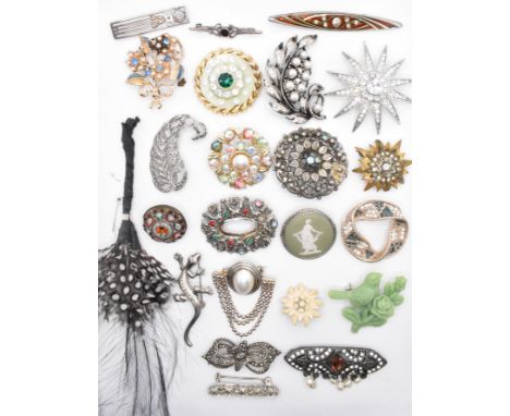 A collection of early 20th century and later vintage brooches to include a vast variety of white metal brooches, Wedgwood bro