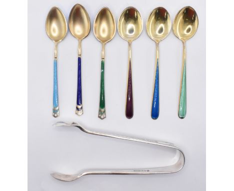A cased set of 20th century silver 925 enamel teaspoons and sugar tongs of Scandinavian origin. Stamped&nbsp; 925 with illegi
