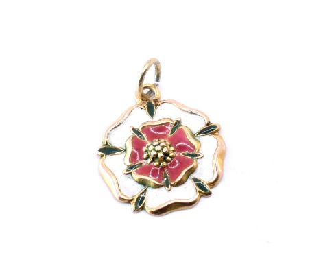 A hallmarked 9ct gold and enamel medallion, medal, pendant, charm. The medal in the form of an English rose having green, red