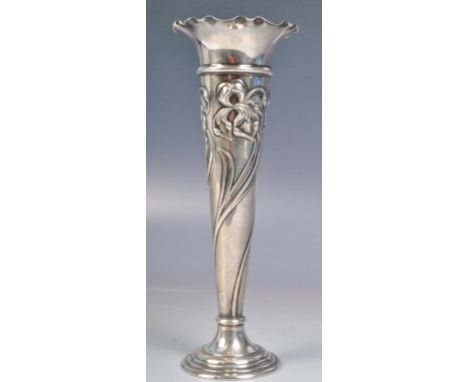 An Edwardian silver hallmarked Art Nouveau trumpet vase by&nbsp;Mappin &amp; Webb Ltd. The vase having a scalloped rim, taper