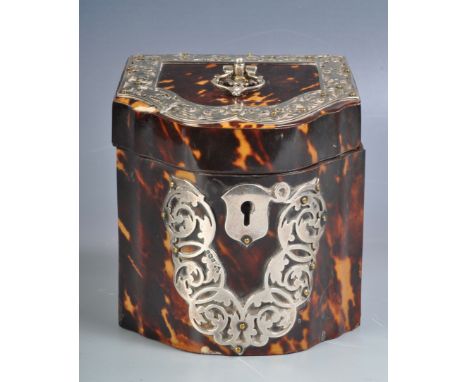An&nbsp; Edwardian Martin, Hall &amp; Co tortoise shell and silver banded tea caddy having a serpentine front with pierced fr