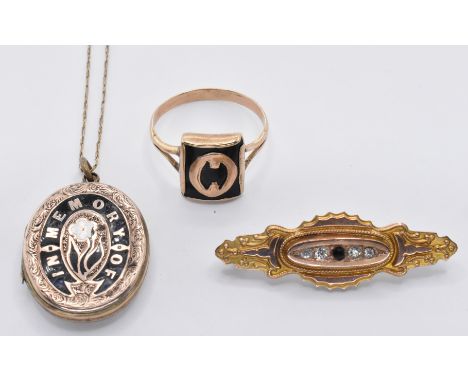 A group of 19th Century Victorian mourning jewellery to include a gold plated locket of oval form having an enamelled ' in me