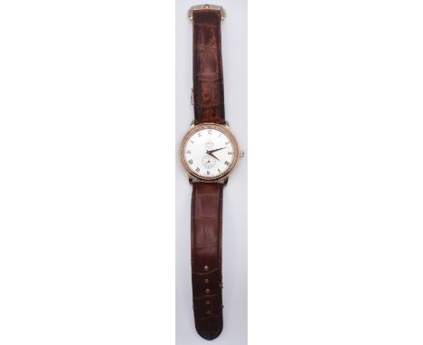 A gentleman's Omega De Ville co- axial 9300 chronometer wrist watch having a silvered dial with rose gold roman numerals to t