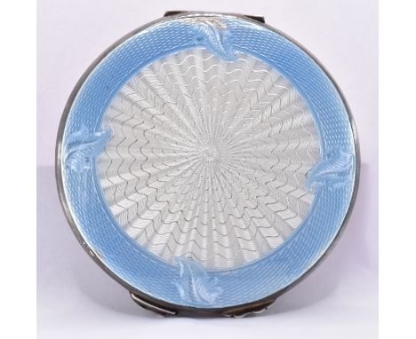 A vintage retro mid 20th century silver hallmarked and enamel powder compact &nbsp;of a circular form with blue and white ena