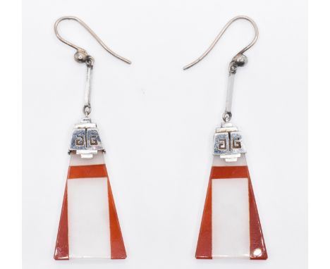 A pair of 1930's Art Deco white gold and hard stone stone panel earrings of triangular form having geometric red and white st