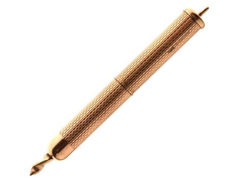 9ct gold propelling tick pick having engine turned case, 6g approx   Condition: 