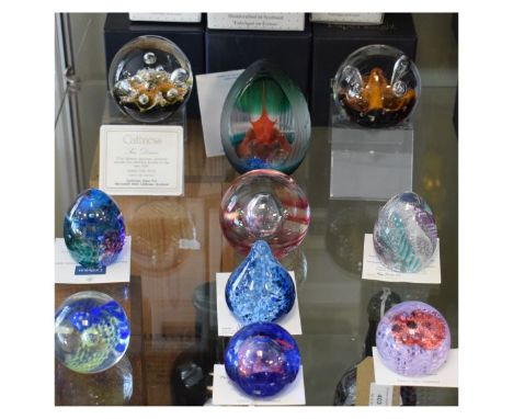 Collection of Caithness glass paperweights - Inner Sanctum, Whirlwind, Moonflower, Sea Dance, Lacemaker, Feather, Raindrop, F
