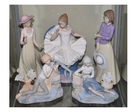 Nao figure of a seated ballerina, two other Nao figures and two other Spanish figures   Condition: 