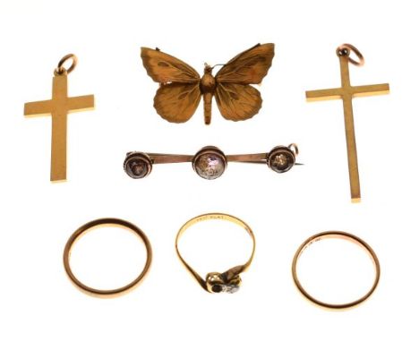 Two 9ct gold crucifix pendants, two gold wedding bands, bar brooch, butterfly brooch and a dress ring   Condition: 