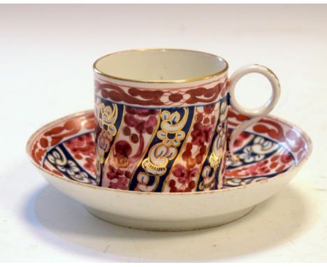 Barr, Flight &amp; Barr Worcester coffee can and saucer having gilt highlighted painted foliate decoration in blue and pink  