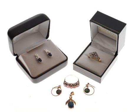 Two dress rings, a pair of opal effect earrings, a similar drop pendant and a pair of sapphire coloured earrings   Condition: