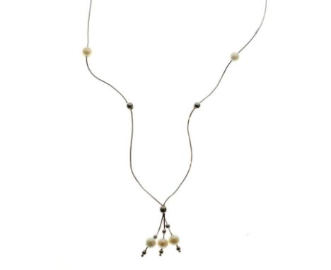 Fraser Hart pendant of three pearls on 9ct white gold fine necklace with pearl spacers, in box of issue   Condition: 