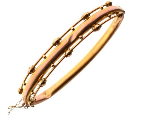 Late 19th/early 20th Century snap bangle stamped 9ct, 7.1g approx   Condition: 