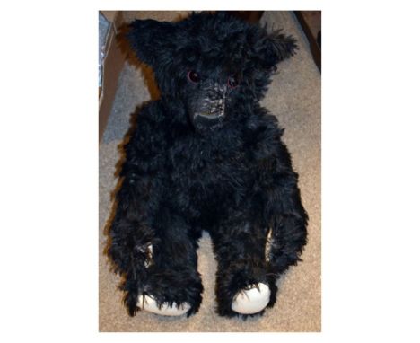 Steiff black mohair '1912' teddy bear, 70cm high   Condition: 