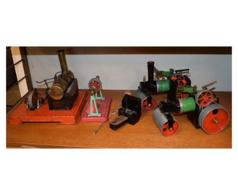 Two Mamod steam rollers, a stationary Mamod engine and separate pulley with wheel   Condition: 