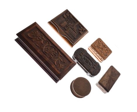 Six assorted carved wooden boxes to include; a circular example with portrait panel, another carved with a steam traction eng