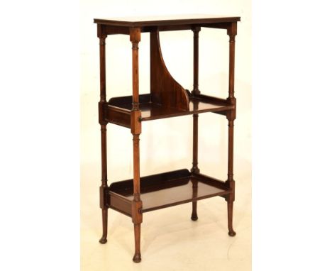 Early 20th Century mahogany three tier what-not standing on a slender ring turned support with pad terminals   Condition: 