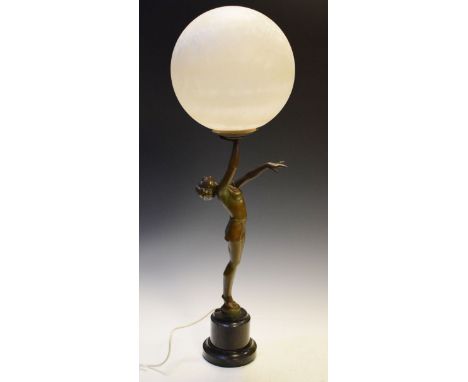 Art Deco bronzed spelter figural lamp formed as a partially clothed lady holding a ball aloft, standing on a black slate socl
