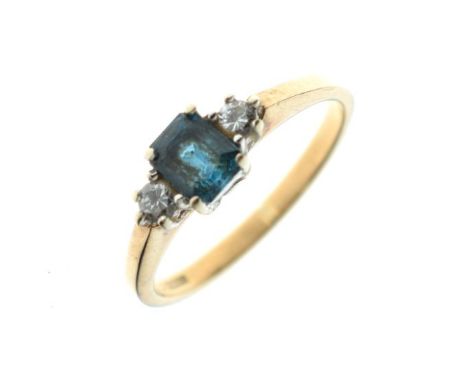 9ct gold dress ring set pale blue emerald cut stone with diamond shoulders, size K, 1.9g approx   Condition: 