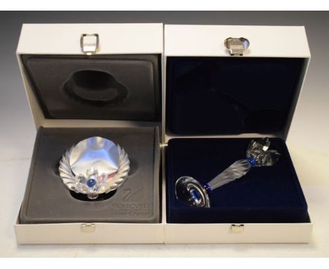 Swarovski silver crystal circular picture frame, together with a similar candlestick, each in original boxes   Condition: 