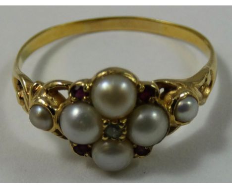 A Victorian gold pearl and diamond cluster ring, ruby points, size P 1/2.
