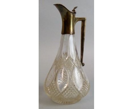 An Edwardian silver mounted cut glass decanter, London 1903, with hinged cover and angular handle, height 26 cm.