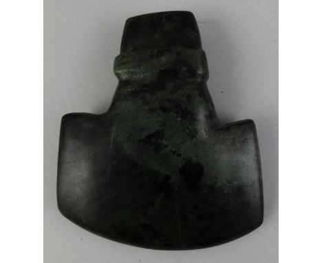 A carved soapstone axe head, 12.5 cm.