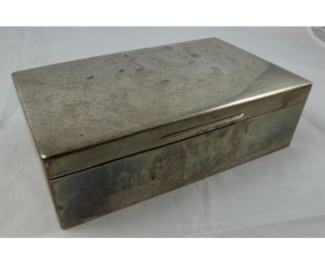 A large silver cigarette or cigar box, London 1924, the engine turned lid to plain sides, opening to reveal three compartment