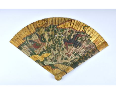 A 19th century Japanese painted wooden fan, Edo period, painted with two ho-ho birds in a flowering tree, between gilt border