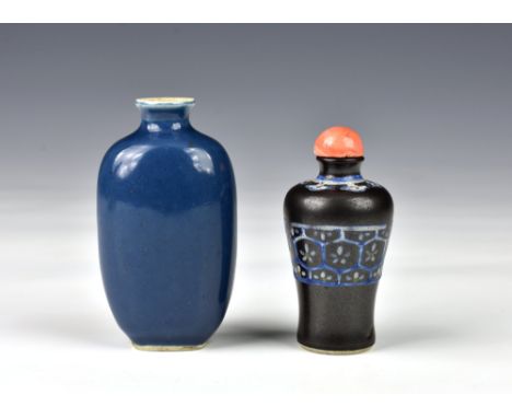 Two Chinese porcelain snuff bottles, one of flattened, ovoid form, in dark powder blue glaze, 6.8cm. high; the second of Meip