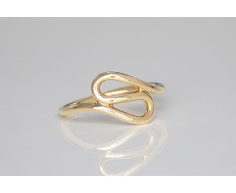 A 9ct yellow gold twist ring, size M½. 