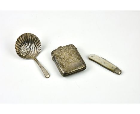 A George III silver caddy spoon, hallmarked with swan import mark, Lion (sterling), the letter 'O' and George III, together w