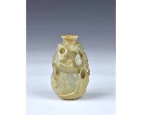A Chinese carved mottle celadon jade snuff bottle, probably 19th century, with faint russet inclusions, of double gourd form,