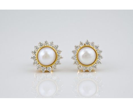 A pair of 18ct yellow gold, pearl and diamond cluster earrings, the single cultured pearl within a border of fifteen brillian