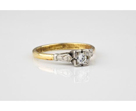 A vintage 18ct gold and diamond single stone ring, mid-century, the square-set brilliant cut diamond over bright cut shaped s