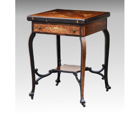 An Edwardian walnut marquetry envelope card table, the floral decorated marquetry and boxwood strung four section top opening