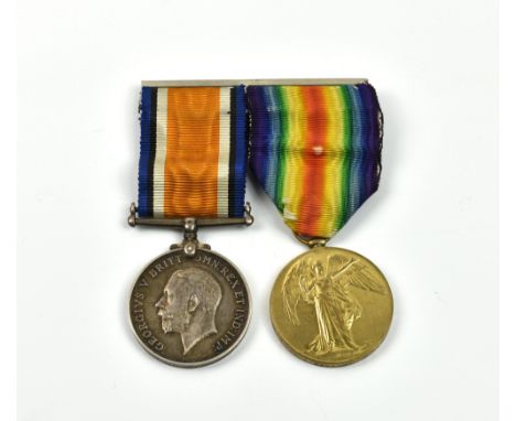 A pair of World War One RGLI medals, the Victory and War medals of PTE 1077 Walter Hawkins Royal Guernsey Light Infantry, mou